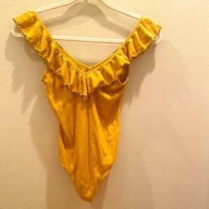 Wilfred thong style bodysuit with ruffling around neckline. Size medium